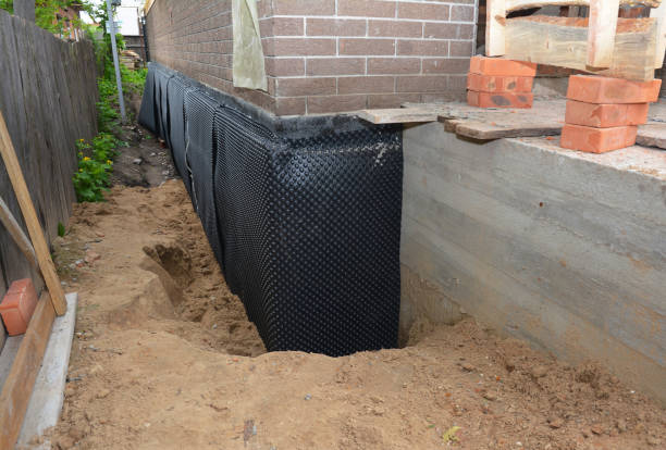 Happy homeowners after waterproofing job in Galesville